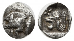 Mysia, Kyzikos. 450-400 B.C. AR hemiobol (9 mm, 0.40 g). Forepart of boar left; to right, tunny upward / Head of roaring lion left; star to upper left...