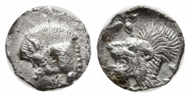 Mysia, Kyzikos. 450-400 B.C. AR hemiobol (9 mm, 0.36 g). Forepart of boar left; to right, tunny upward / Head of roaring lion left; star to upper left...