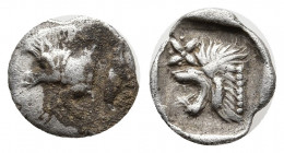 Mysia, Kyzikos. 450-400 B.C. AR hemiobol (9.5 mm, 0.40 g). Forepart of boar left; to right, tunny upward / Head of roaring lion left; star to upper le...