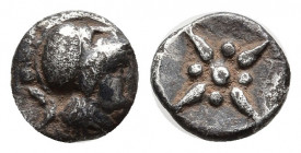 Troas, Kolone. 5th-4th cenuries B.C. AR hemiobol (7 mm, 0.36 g). Head (of Athena?) right, wearing crested Corinthian helmet / Stellate pattern consist...