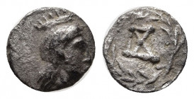 Cyprus, Salamis(?) or Kephallenia, Paleis(?) AR Tetartemorion. Circa 4th - 2nd century BC. Turreted female head to right / Π X (?) monogram within oli...