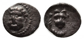 CILICIA, Isaura Palaia. Circa 333-322 BC. AR Tetartemorion (7mm, 0.21 g). Head of Herakles facing slightly left / Facing lion’s head; [YΛYΓCΩ] below. ...