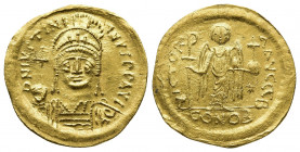 Justinian I, 527-565. Solidus (Gold, 20mm, 4.39 g), Constantinople. D N IVSTINIANVS P P AVI Helmeted and cuirassed bust of Justinian facing, holding g...