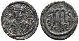 Tiberius II Constantine. 578-582. Æ Follis (30mm, 12.46 g). Constantinople mint, 5th officina. Dated RY 8 (AD 581/2). Crowned facing bust, wearing con...