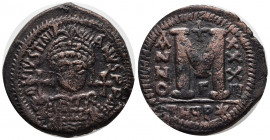 Justinian I, 527-565. Follis (Bronze, 34 mm, 20.55), Theoupolis (Antiochia), RY 33 = 559/60. D N IVSTINI-ANVS P P AVI Helmeted and cuirassed bust of J...