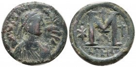 Justinian I. 527-565. Æ Follis (32mm, 18.42 g). Nicomedia mint, 1st officina. Struck 527-537. Diademed, draped, and cuirassed bust right / Large M; cr...