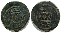 PHOCAS (602-610). Half Follis. Kyzikos.
Obv: Dm POCΔ PERP AVC.
Crowned bust facing, wearing consular robes and holding mappa and cross.
Rev: Large XX;...