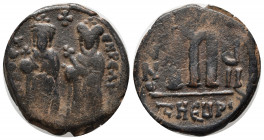 PHOCAS. 602-610 AD. Æ25 Follis (25mm, 9.52 gm). Antioch mint. Dated year 8 (609/10 AD). Crowned figures of Phocas and Leontia standing facing / Large ...