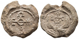 Byzantine Lead seal. Eustratios (Circa 7th century).
Obv: Eagle standing facing, head right, with wings spread; above, cruciform invocative monogram: ...