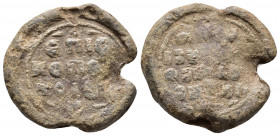 Byzantine lead seal.
7th-10th century. PB Seal. Uncertain.
Obv : Legend in three lines.
Rev : Legend in four lines.
Weight: 13.23 g.
Diameter: 25 mm.