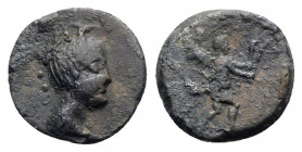 Central Italy, Uncertain, c. 1st century BC. Æ (15mm, 2.77g, 12h). Female head r.; three pellets behind. R/ Cupid walking r., holding two torches. HNI...