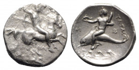 Southern Apulia, Tarentum, c. 332-302 BC. AR Nomos (21mm, 7.45g, 3h). Warrior, holding shield and two spears, preparing to cast a third, on horseback ...