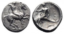 Southern Apulia, Tarentum, c. 332-302 BC. AR Nomos (20mm, 7.73g, 3h). Horseman riding r., holding two spears and shield, preparing to cast third spear...