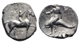 Southern Apulia, Tarentum, c. 302-280 BC. AR Nomos (18mm, 7.54g, 9h). Youth on horseback r., crowning horse; ΣA to l., APE/ΘΩN in two lines below. R/ ...