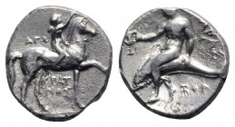 Southern Apulia, Tarentum, c. 302-280 BC. AR Nomos (20mm, 7.63g, 6h). Youth on horseback r., crowning horse; AΓΩ to l., KPAT/INOΣ below. R/ Phalanthos...