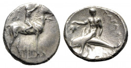 Southern Apulia, Tarentum, c. 302-280 BC. AR Nomos (19mm, 7.64g, 3h). Youth on horseback r., crowning horse with wreath; ΣA to l., ΦIΛI/APXOΣ in two l...