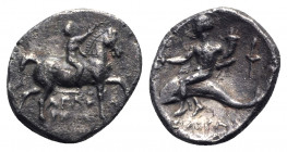 Southern Apulia, Tarentum, c. 272-240 BC. AR Nomos (22mm, 5.98g, 3h). Youth on horseback r., crowning horse with wreath. R/ Phalanthos riding dolphin ...