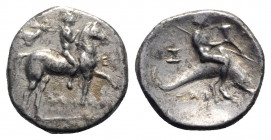 Southern Apulia, Tarentum, c. 272-240 BC. AR Nomos (21mm, 6.12g, 3h). Nude rider on horseback r.; above, Nike flying r., crowning rider; EY to r., ΔAM...