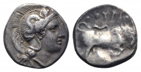 Southern Lucania, Thourioi, c. 400-350 BC. AR Stater (18mm, 6.87g, 9h). Helmeted head of Athena r., helmet decorated with Skylla pointing and holding ...