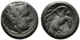 Bruttium, Kroton, c. 350-300 BC. Æ (17mm, 7.02g, 1h). Head of Herakles r., wearing lion skin; ΔI above. R/ Eagle r., alighting on snake. HNItaly 2217;...