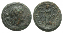 Bruttium, Petelia, late 3rd century BC. Æ Sextans (15mm, 3.16g, 3h). Laureate head of Apollo r. R/ Artemis Phosphoros standing l.; two monograms to l....