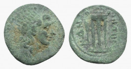 Bruttium, Petelia, late 3rd century BC. Æ Sescuncia(?) (13.5mm, 2.99g, 12h). Radiate head of Helios r. R/ Tripod. HNItaly 2465. Green patina, VF