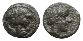 Bruttium, Rhegion, c. 415/0-387 BC. Æ (11mm, 1.89g, 5h). Facing lion's scalp. R/ Laureate head of Apollo r. HNItaly 2524; SNG ANS 698-701. About VF