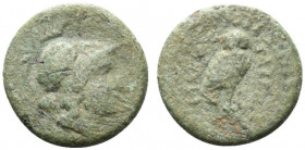 Magna Graecia, Uncertain mint, c. 3rd century BC. Æ (10mm, 1.46g, 11h). Helmeted head of Athena r. R/ Owl standing facing, head facing. Cf. HNItaly 19...