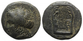 Sicily, Adranon, c. 340-330 BC. Æ Litra (30mm, 28.14g, 5h). Laureate head of Apollo l. R/ Lyre. Campana 3; CNS III, 3 OS; HGC 2, 42. Rare, green patin...
