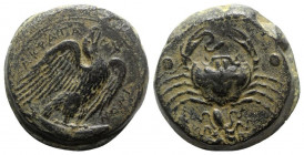 Sicily, Akragas, c. 425-406 BC. Æ Hemilitron (27mm, 24.35g, 9h). Eagle standing r. on tunny. R/ Crab; conch shell and octopus below, six pellets aroun...