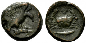 Sicily, Akragas, c. 420-406 BC. Æ Tetras – Trionkion (17mm, 7.24g, 3h). Eagle standing r., head lowered, on hare held in its talons. R/ Crab; leaf abo...