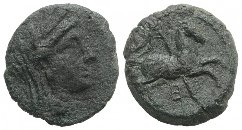 Sicily, Morgantina. Punic occupation, c. 214-210 BC. Æ (22mm, 7.46g, 6h). Veiled...