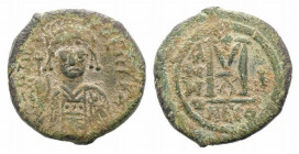 Maurice Tiberius (582-602). Æ 40 Nummi (30mm, 13.63g, 6h). Nicomedia, year 6 (587/8). Helmeted and cuirassed bust facing, holding globus cruciger and ...