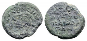 Byzantine Pb Seal, c. 7th-12th century (21.5mm, 8.66). Figure standing facing(?). R/ Legend in four lines. Good Fine
