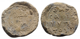 Byzantine Pb Seal, c. 7th-12th century (25mm, 15.48g, 12h). Eagle standing facing, head r., with wings spread; cruciform monogram above. R/ Legend in ...