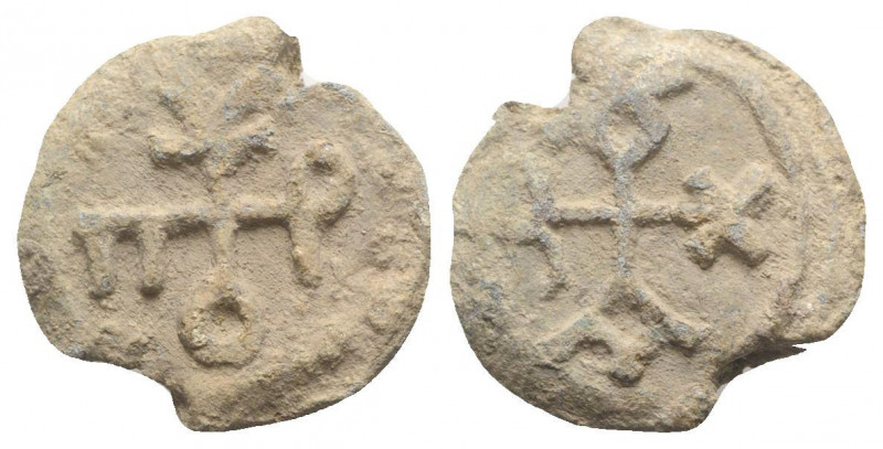 Byzantine Pb Seal, c. 7th-12th century (23mm, 11.68g). Cruciform monogram. R/ Cr...