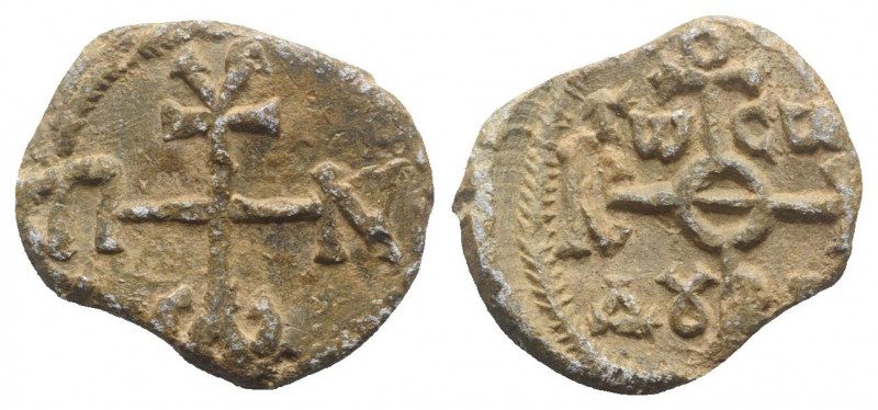 Byzantine Pb Seal, c. 7th-12th century (25mm, 19.90g). Cruciform monogram. R/ Cr...
