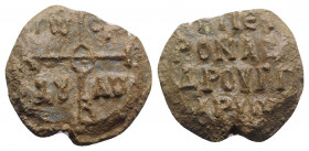 Byzantine Pb Seal, c. 7th-12th century (26.5mm, 14.89g). Cruciform monogram. R/ Legend in four lines. VF