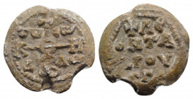 Byzantine Pb Seal, c. 7th-12th century (24.5mm, 10.99g). Cruciform monogram. R/ Legend in three lines. VF - Good VF