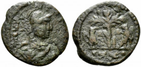 Ostrogoths, Athalaric (526-534). Æ 20 Nummi (18mm, 5.46g, 6h). Rome. Helmeted and draped bust of Roma r. R/ Palm tree between two eagles, each with wi...