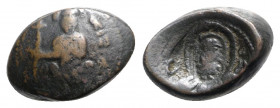 Italy, Sicily, Messina, Ruggero II (1105-1130). Æ Trifollaro (18mm, 7.17g, 5h). Ruggero seated facing, holding cross-tipped sceptre. R/ Facing bust of...