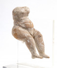 Greek terracotta seated Putto; traces of cromy; ca. 3rd century BC; set on a plexiglas stand in the 1990s; height without stand cm 8,3, with it cm 10,...