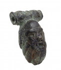 Roman bronze pendant in the shape of a Satyr head; ca. 1st century BC - 2nd century AD; height cm 3