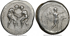 PAMPHYLIA. Aspendus. Ca. 325-250 BC. AR stater (25mm, 1h). NGC VF. Two wrestlers grappling; E between / ΕΣΤFΕΔΙΥ, slinger standing right, placing bull...