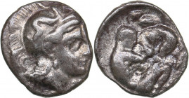 Calabria - Tarentum - AR Diobol (circa 325-280 BC)
1.00 g. 12mm. VF/VF Head of Athena right, wearing helmet decorated with Skylla./ Heracles kneeling...