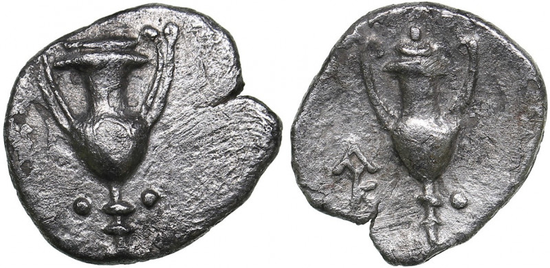 Calabria - Tarentum - AR Obol (circa 280-228 BC)
0.41 g. 10mm. VF/VF Kantharos ...