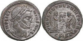Roman Empire - Siscia Æ Follis - Licinius I (308-324 AD)
3.64 g. 20mm. AU/AU IMP LICI-NIVS AVG/ VICT LAETAE PRINC PERP / ΓSIS, VOT / PR. RIC 96.