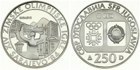 Yugoslavia 250 Dinara 1982 1984 Winter Olympics. Averse: Emblem and Olympic logo on separate shields within flat bottom circle. Reverse: Sarajevo view...