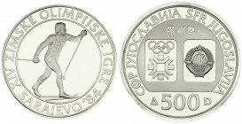 Yugoslavia 500 Dinara 1984 Cross-country Skiing. Averse: Emblem and Olympic logo on separate shields within flat bottom circle. Reverse: Cross-country...
