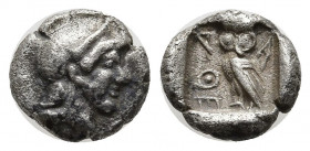 Greek Coins
Attica. Athens 500-480 BC.Head of Athena with profile eye to right, wearing crested Attic helmet / ΑΘΕ, owl standing to left, head facing...